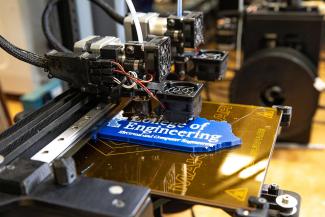 3D printer in EPIC Lab printing a Kentucky shape