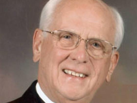 Fred T. May.